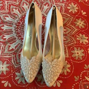 Women’s 9 1/2 white 3 inch dress heels.